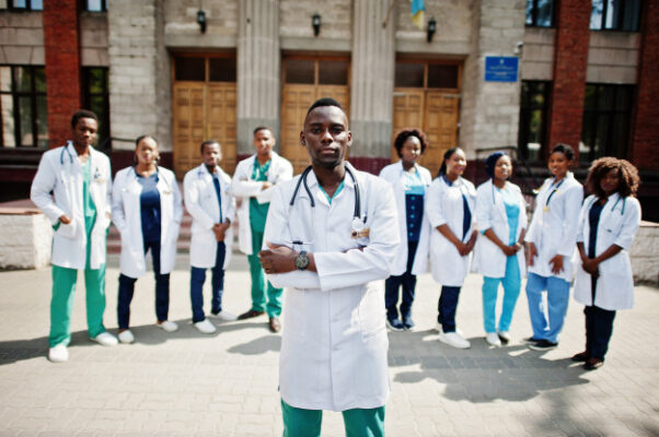 group-african-doctors-students-near-medical-university-outdoor_151355-4637