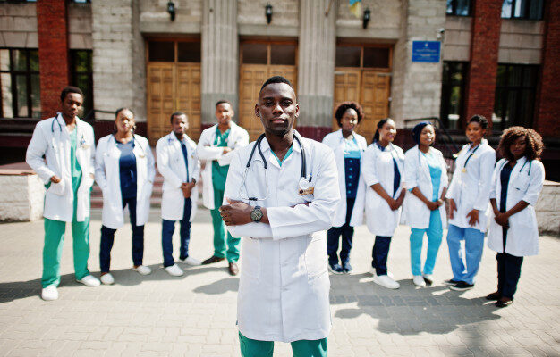 group-african-doctors-students-near-medical-university-outdoor_151355-4637